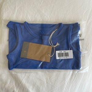 Kyte baby sleeveless body suit in indigo